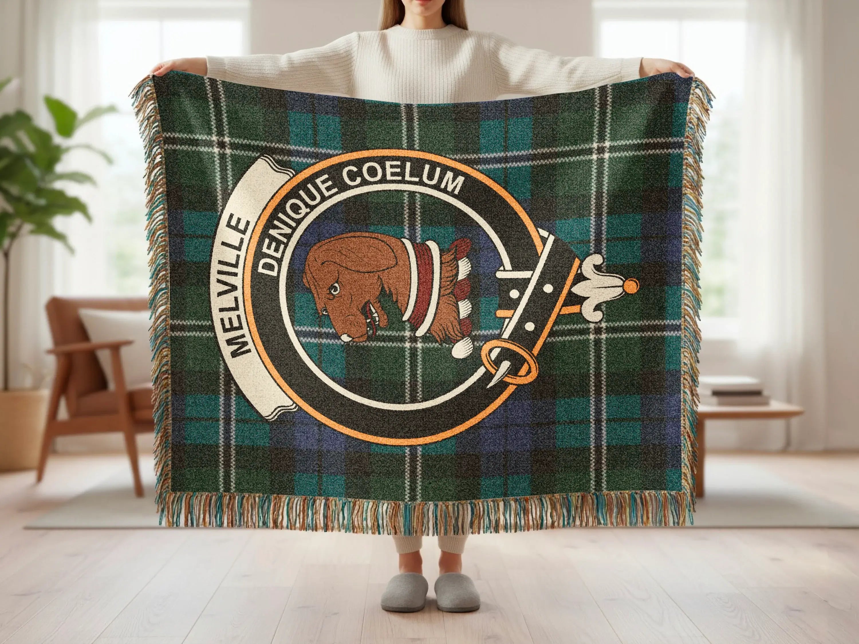 Melville tartan woven blanket showing clan crest detail — cotton construction with fringe border