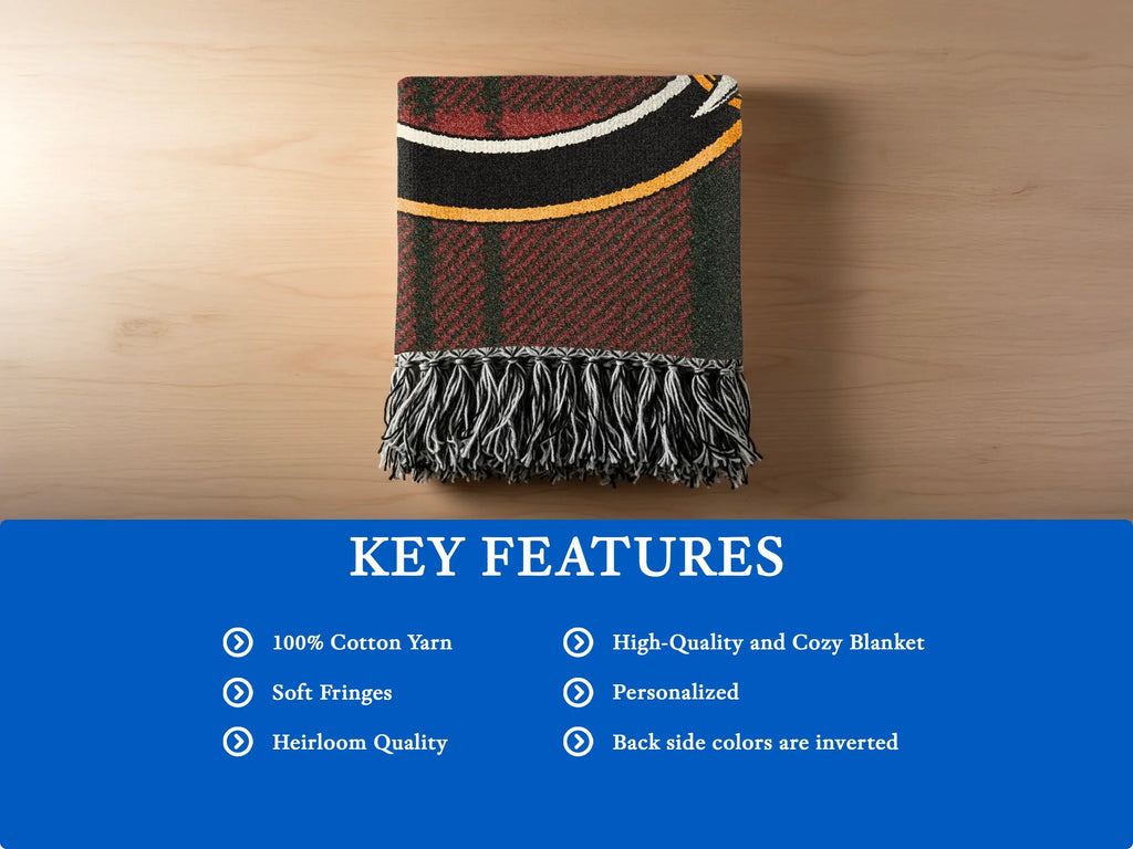 Clan Dunbar cotton woven blanket folded — showing fringe edge and tartan weave texture