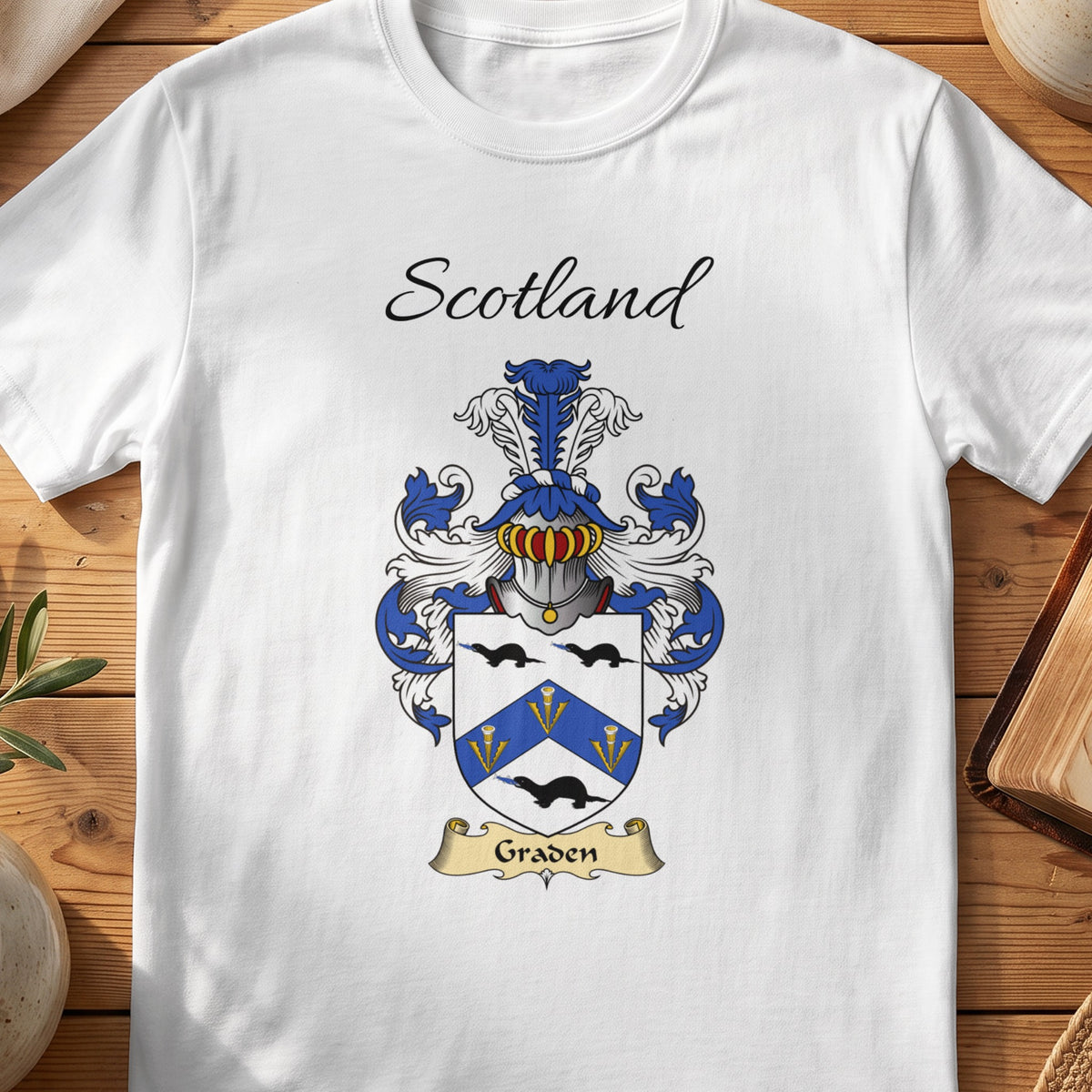 White Graden Scottish family shield T-shirt featuring a blue chevron between black birds