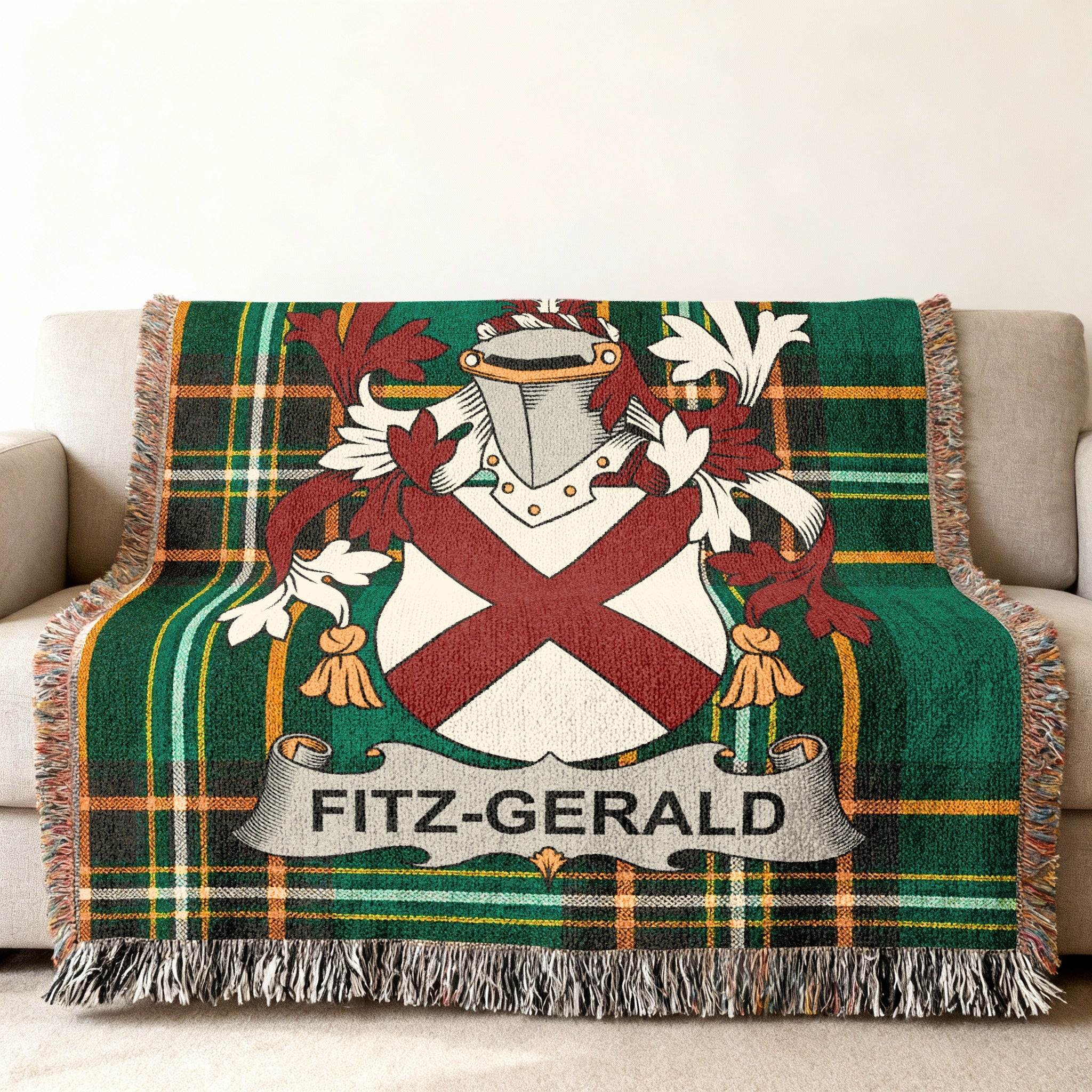 Fitz-Gerald family crest on a green tartan woven blanket.