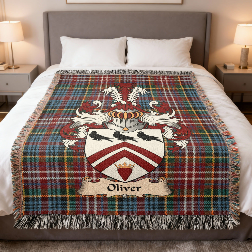 Oliver family crest emblem on a Caledonia tartan woven blanket