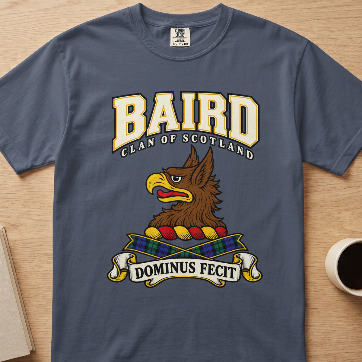 Baird clan crest with brown griffin head on a slate blue Comfort Colors T-shirt, front view