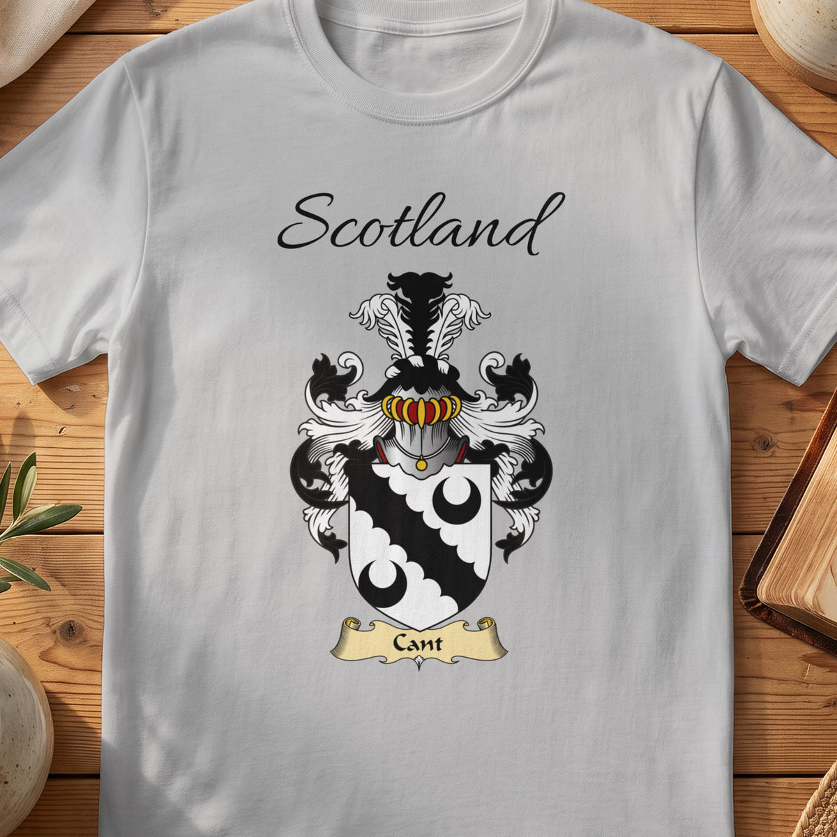 Sport Grey Cant Scottish family shield T-shirt featuring a black scalloped diagonal band between black crescents