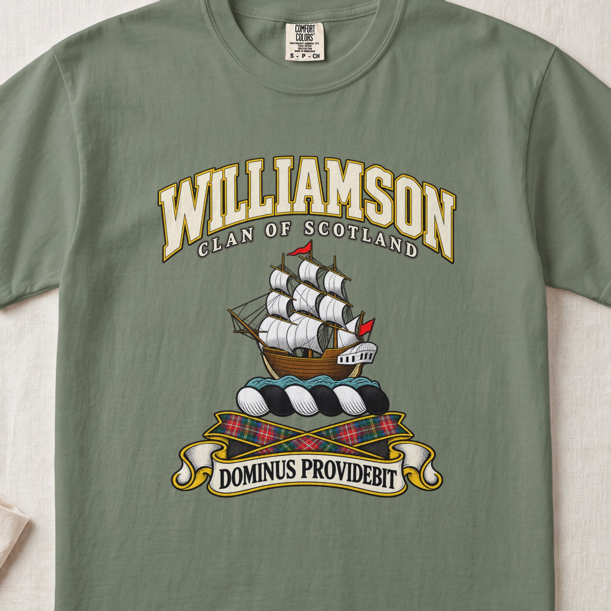 Williamson Scottish clan T-shirt in Moss, front view with a sailing ship with white sails and motto banner.