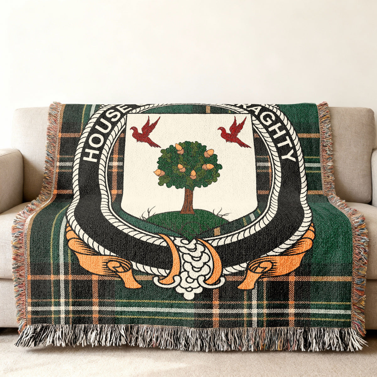 MacGeraghty Irish National Tartan woven blanket displayed on a sofa