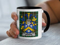 White mug with black handle featuring the Gervais family crest on a green plaid background.