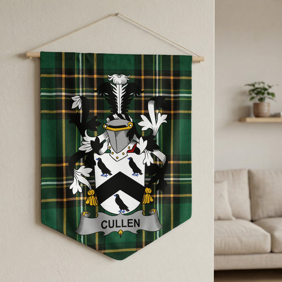Crest on green tartan banner with text "CULLEN" hanging from wooden rod.