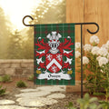 Green plaid flag with the Owen family crest featuring white lions and red shield.