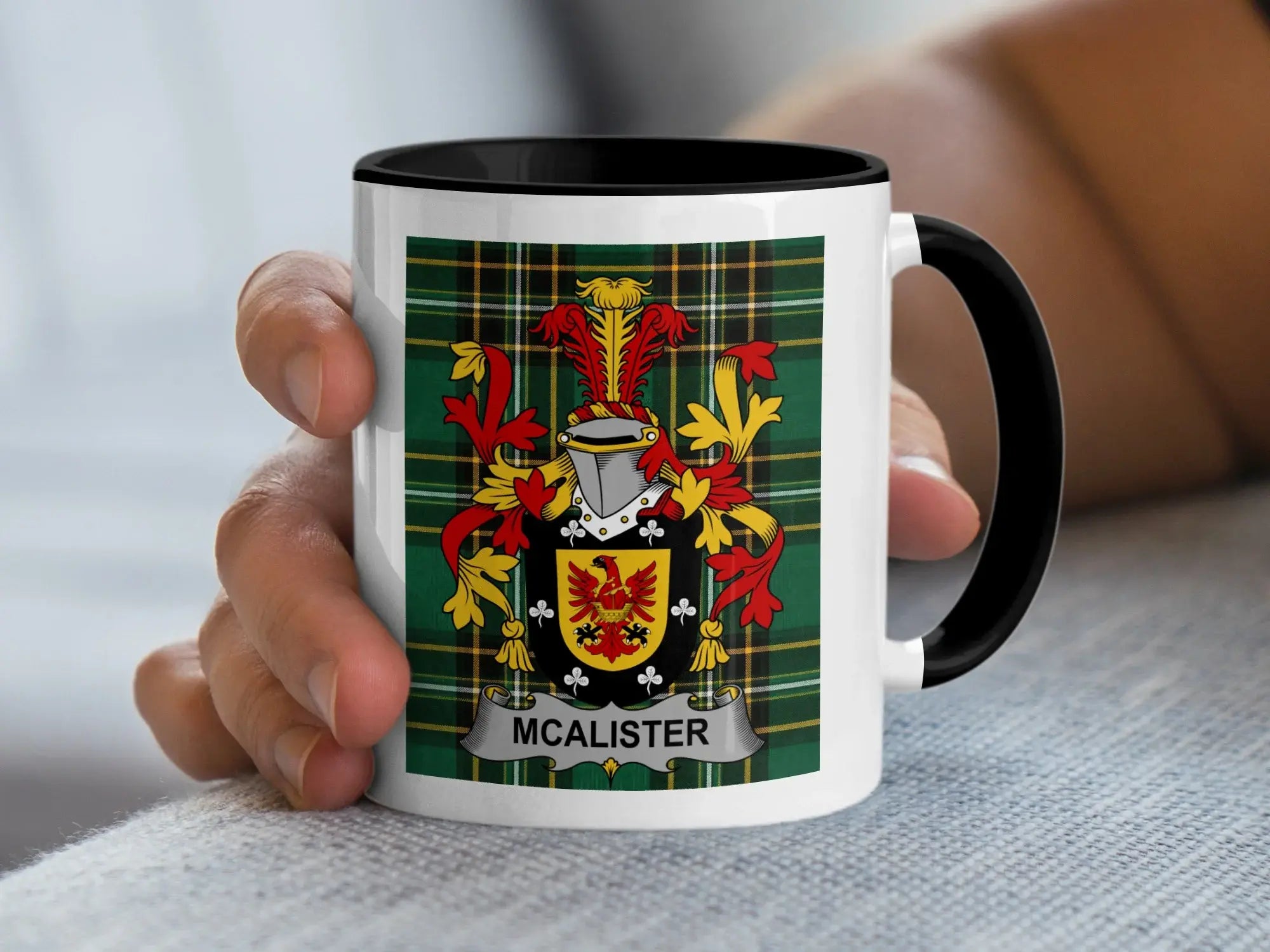 McAlister family crest on a plaid pattern mug.