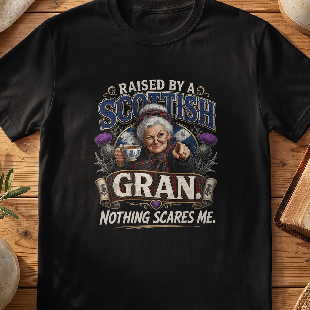 Black Gildan 64000 unisex T-shirt flatlay with Raised by a Scottish Gran Scottish graphic design