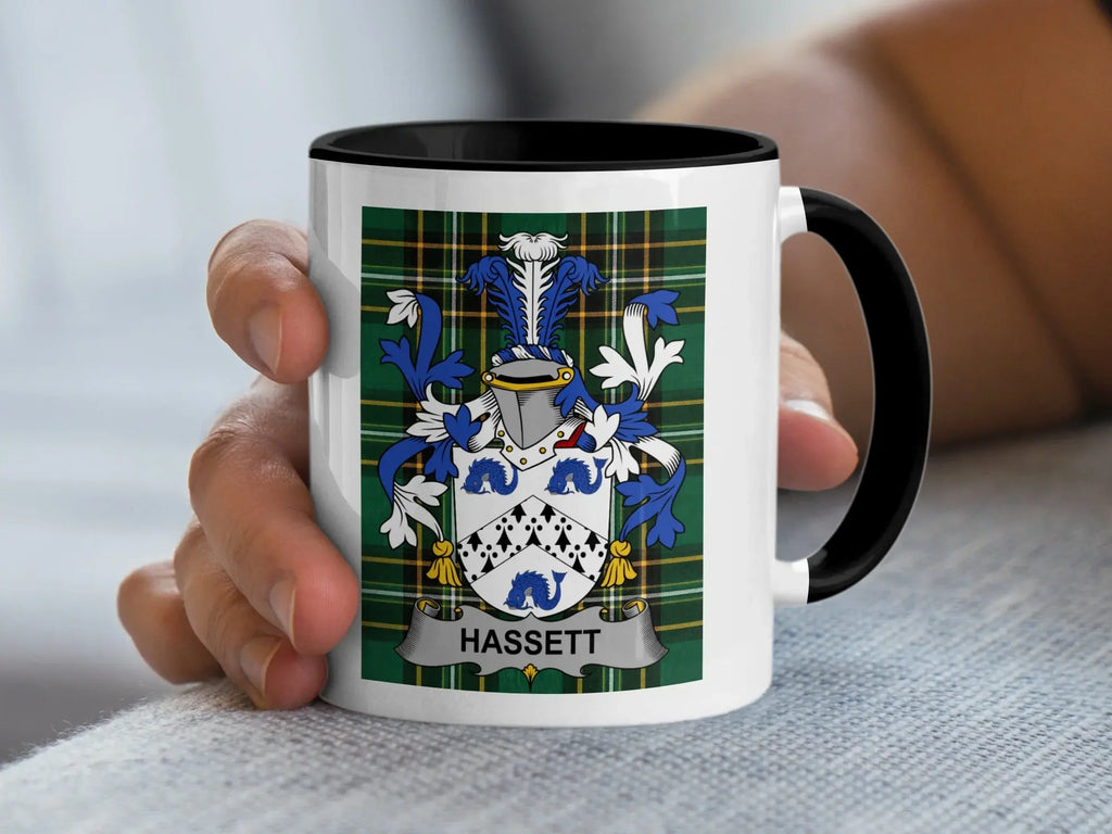 White mug with black rim displaying a coat of arms and "HASSETT" banner.