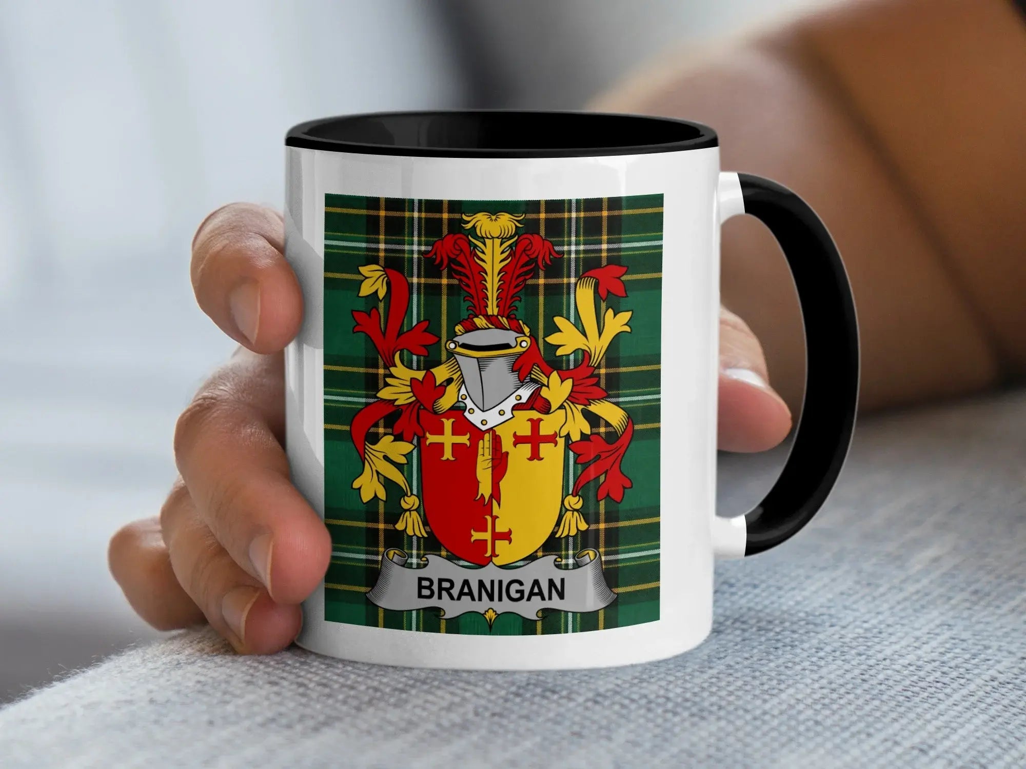 Branigan Irish family crest accent mug with black handle on Irish National Tartan