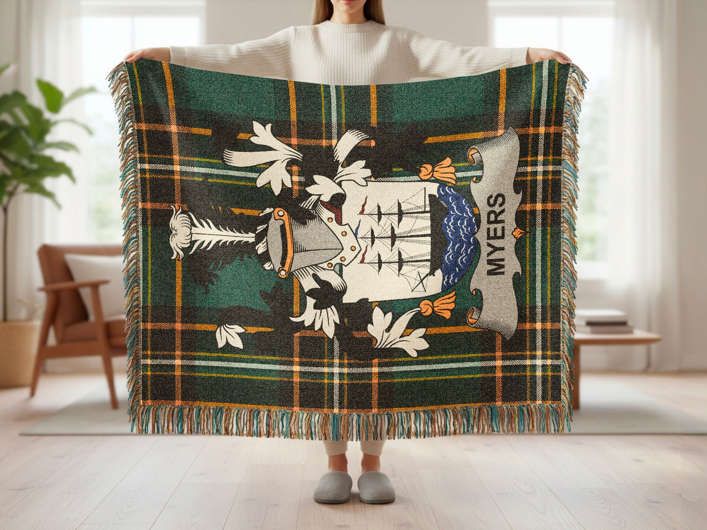 Tartan blanket with heraldic crest and "MYERS" text.