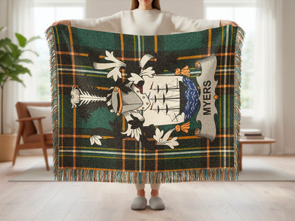 Tartan blanket with heraldic crest and "MYERS" text.