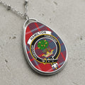 Hamilton clan crest pendant with tartan background on a silver chain.