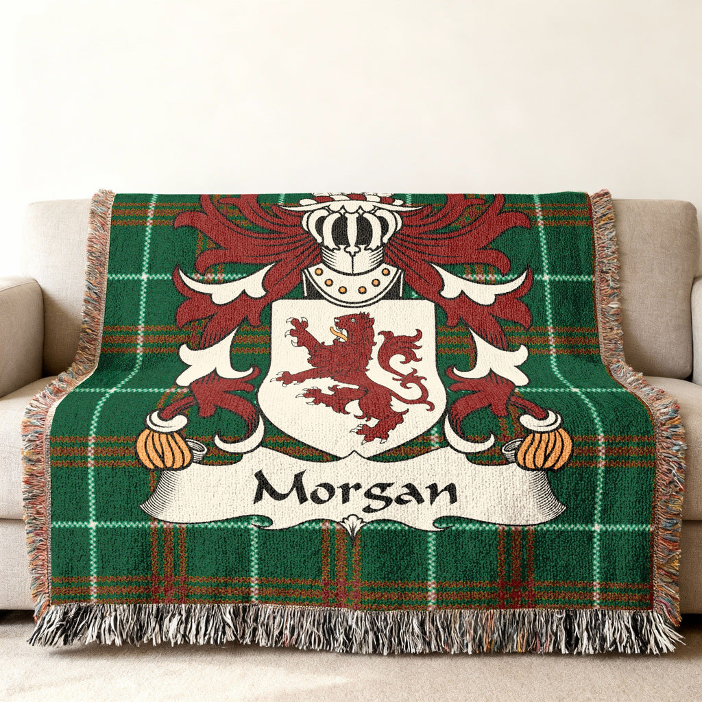 Green tartan plaid throw blanket with Morgan family crest.