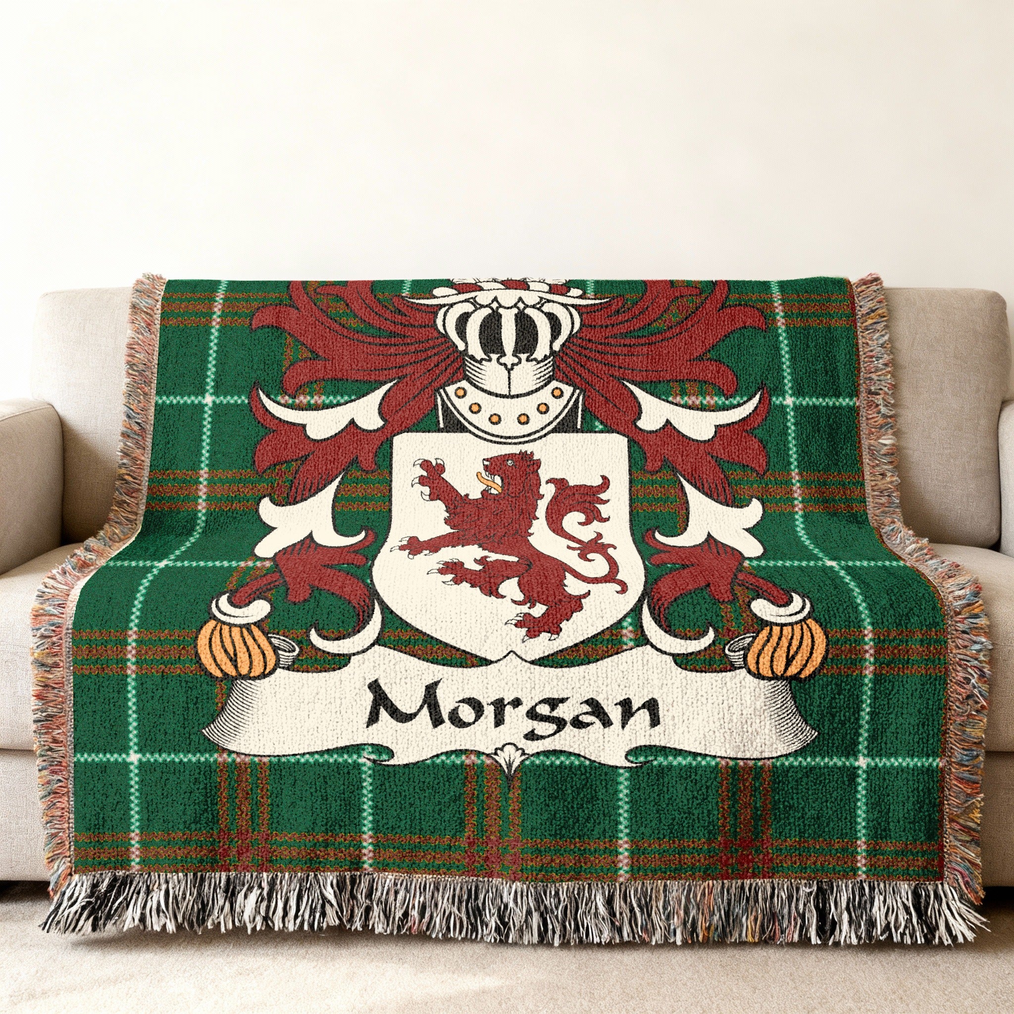 Green tartan plaid throw blanket with Morgan family crest.