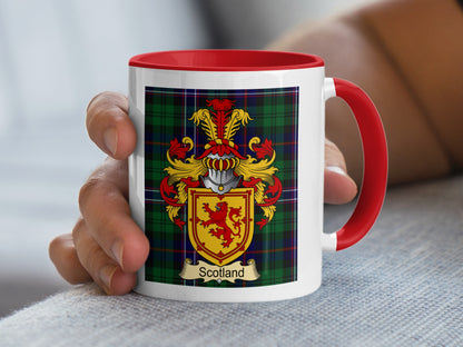 Mug with Scottish crest and tartan pattern.