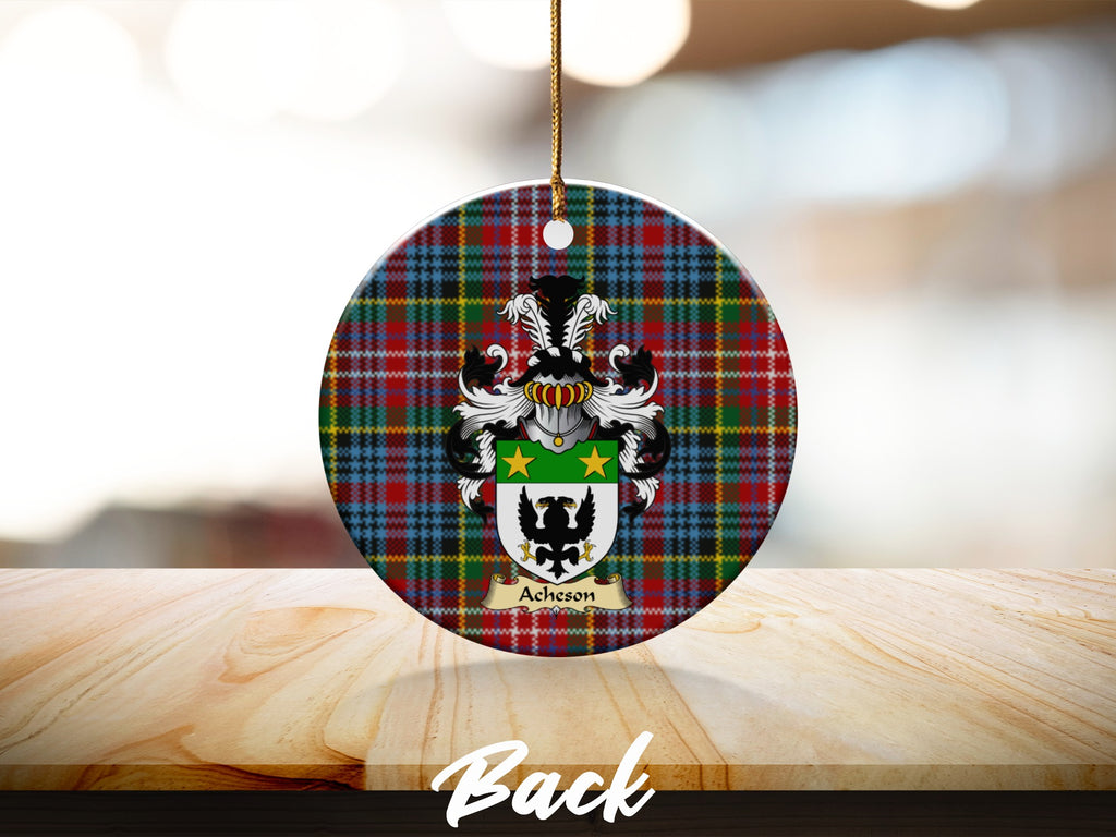 Round Acheson Scottish clan ornament with family crest on a Caledonia tartan background