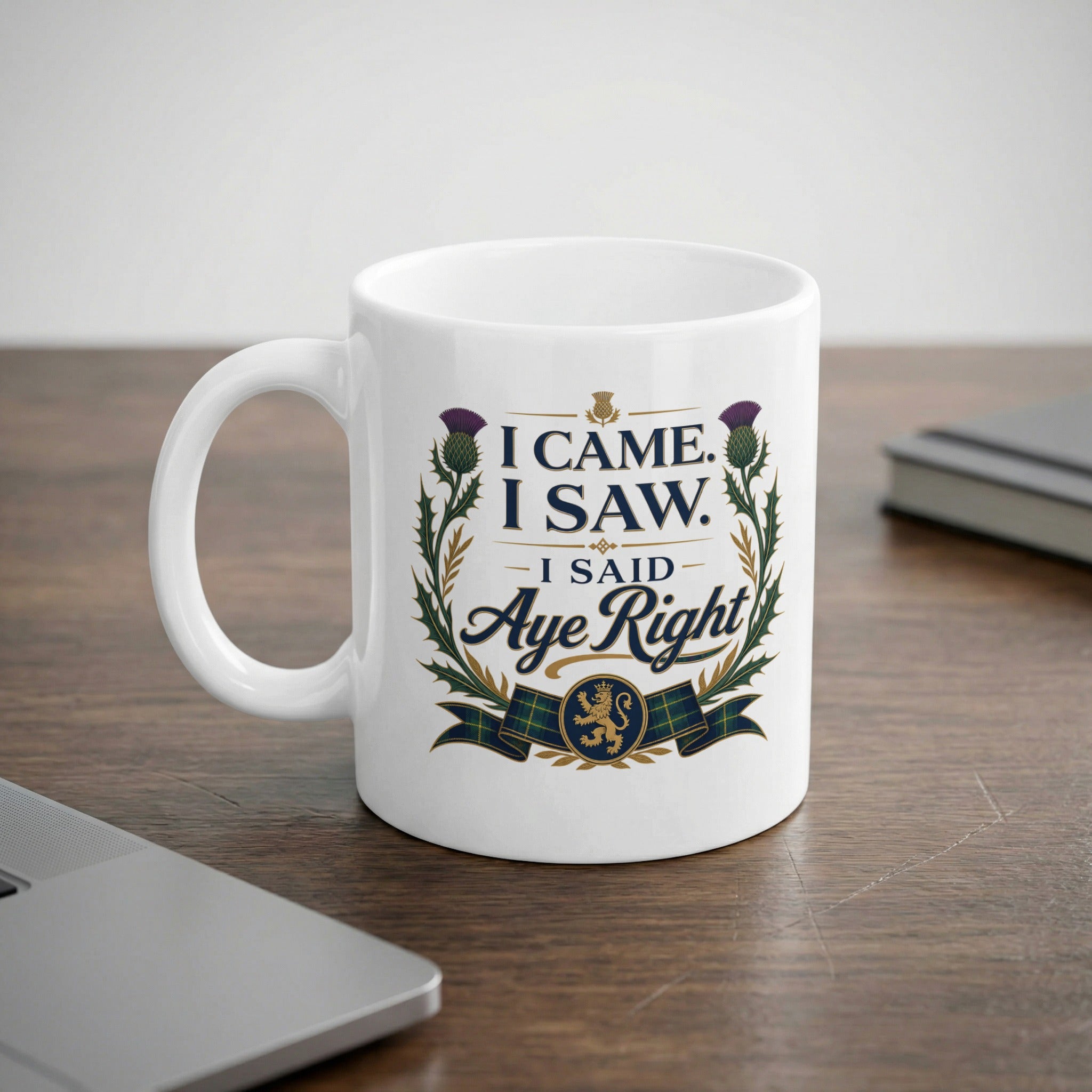 White mug with "I CAME. I SAW. I SAID AYE RIGHT" and Scottish thistle graphic.