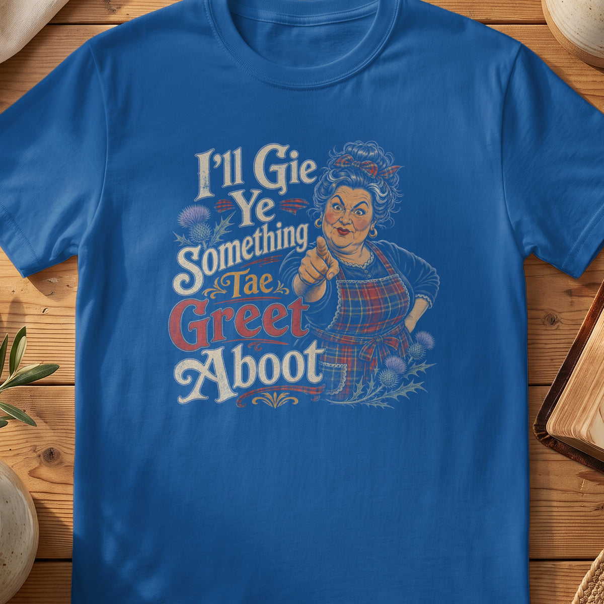 Royal blue t-shirt with illustration: "I'll Gie Ye Something Tae Greet Aboot".