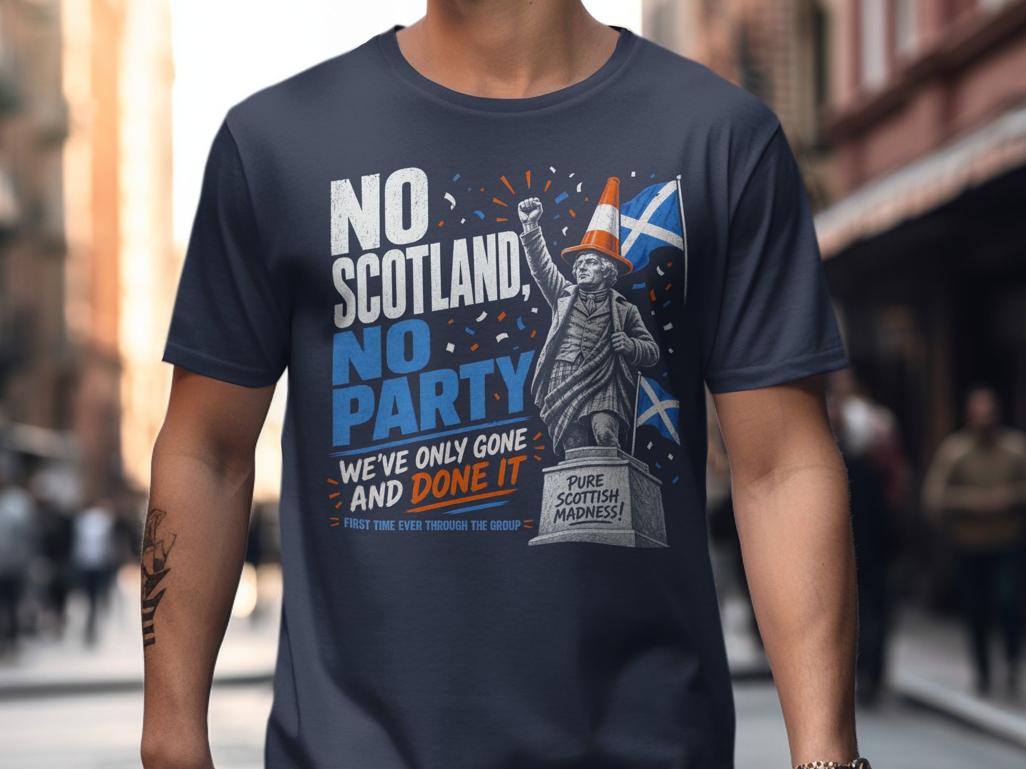 T-shirt with "No Scotland, No Party" text and Scottish figure.