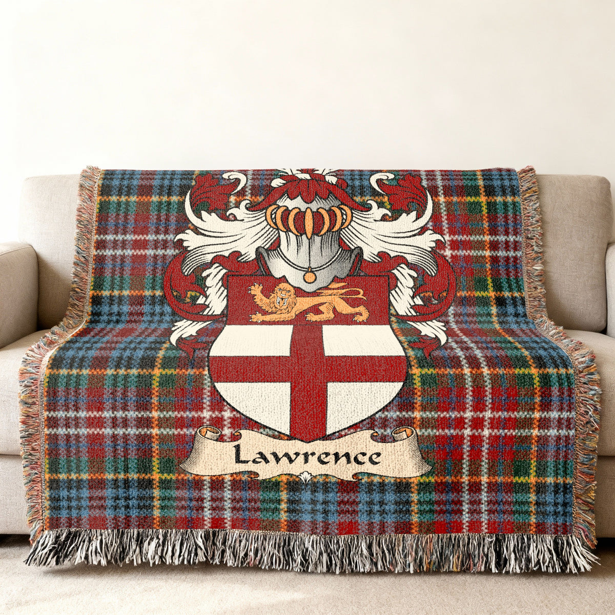 Lawrence family crest emblem on a Caledonia tartan woven blanket