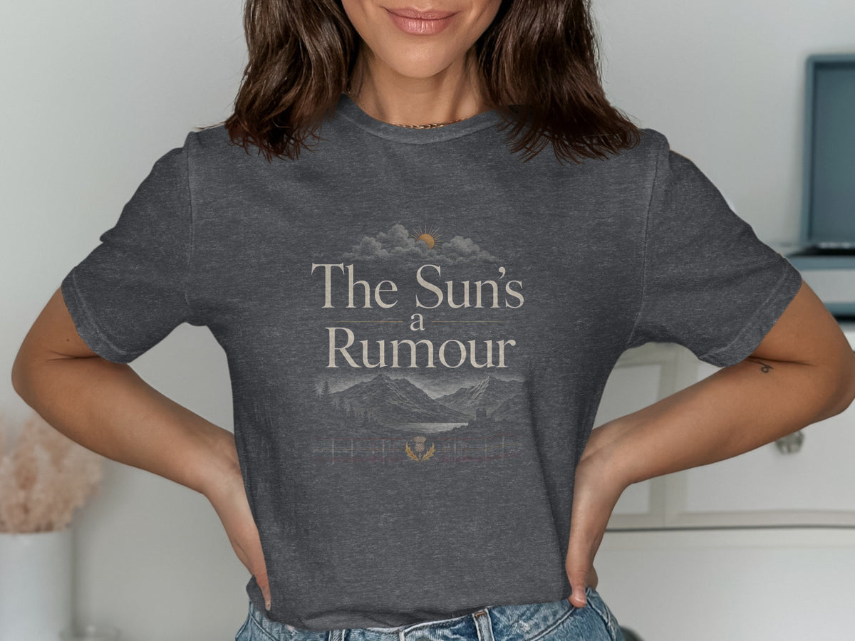 Dark gray t-shirt with "The Sun's a Rumour" text and a landscape graphic.