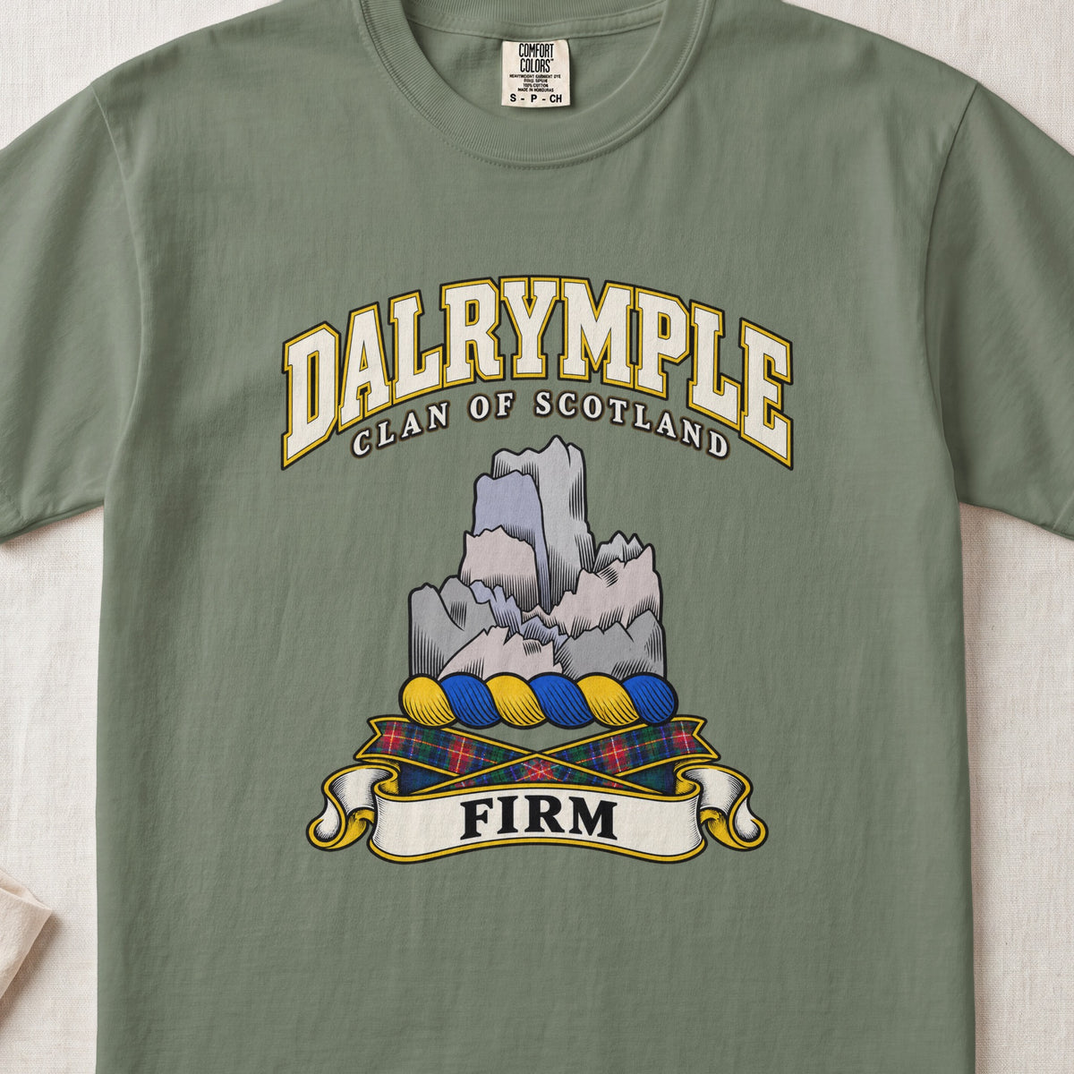 Dalrymple Scottish clan T-shirt in Moss, front view with a gray rock formation and motto design.