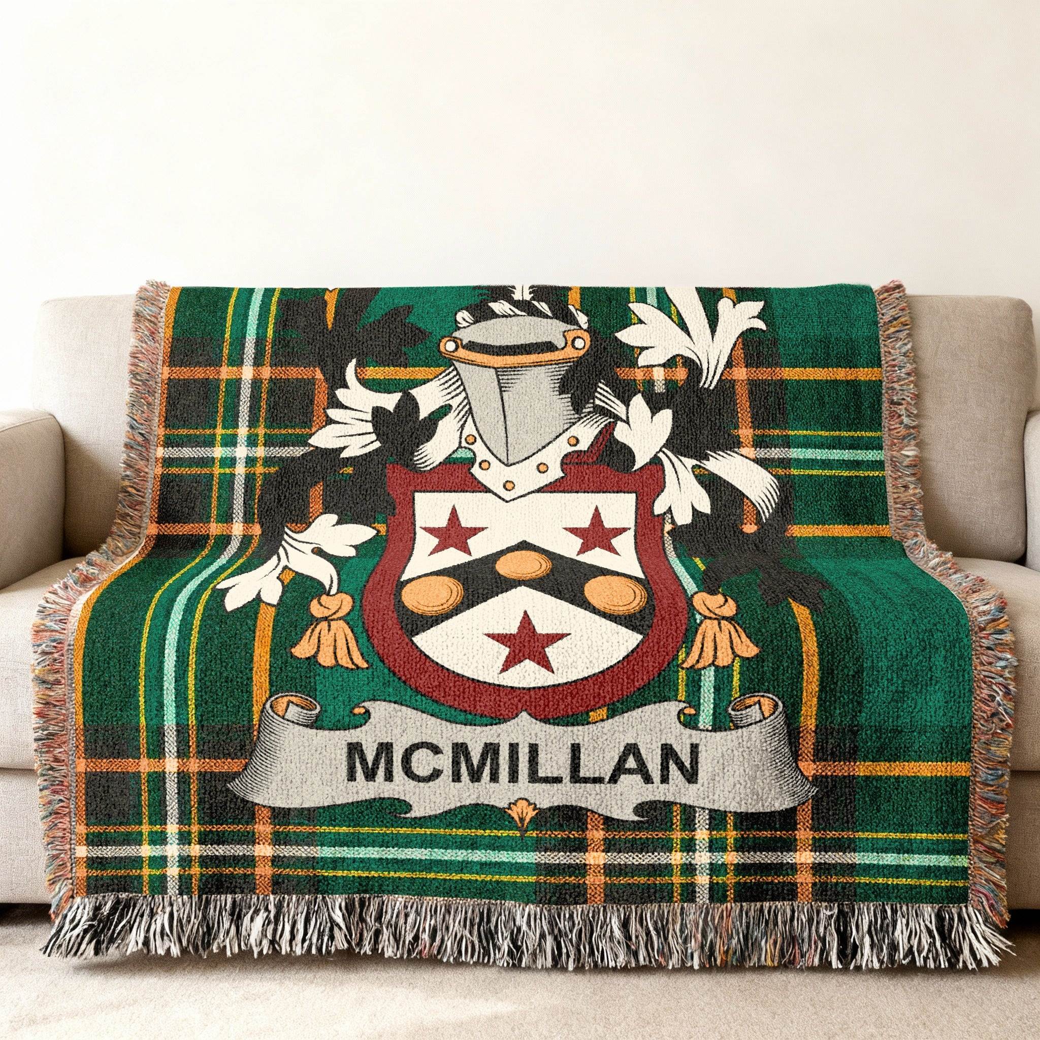 Plaid throw blanket with McMillan family crest.