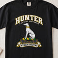 Hunter Scottish clan T-shirt in Black, front view with a seated white hound with a golden collar and motto banner.