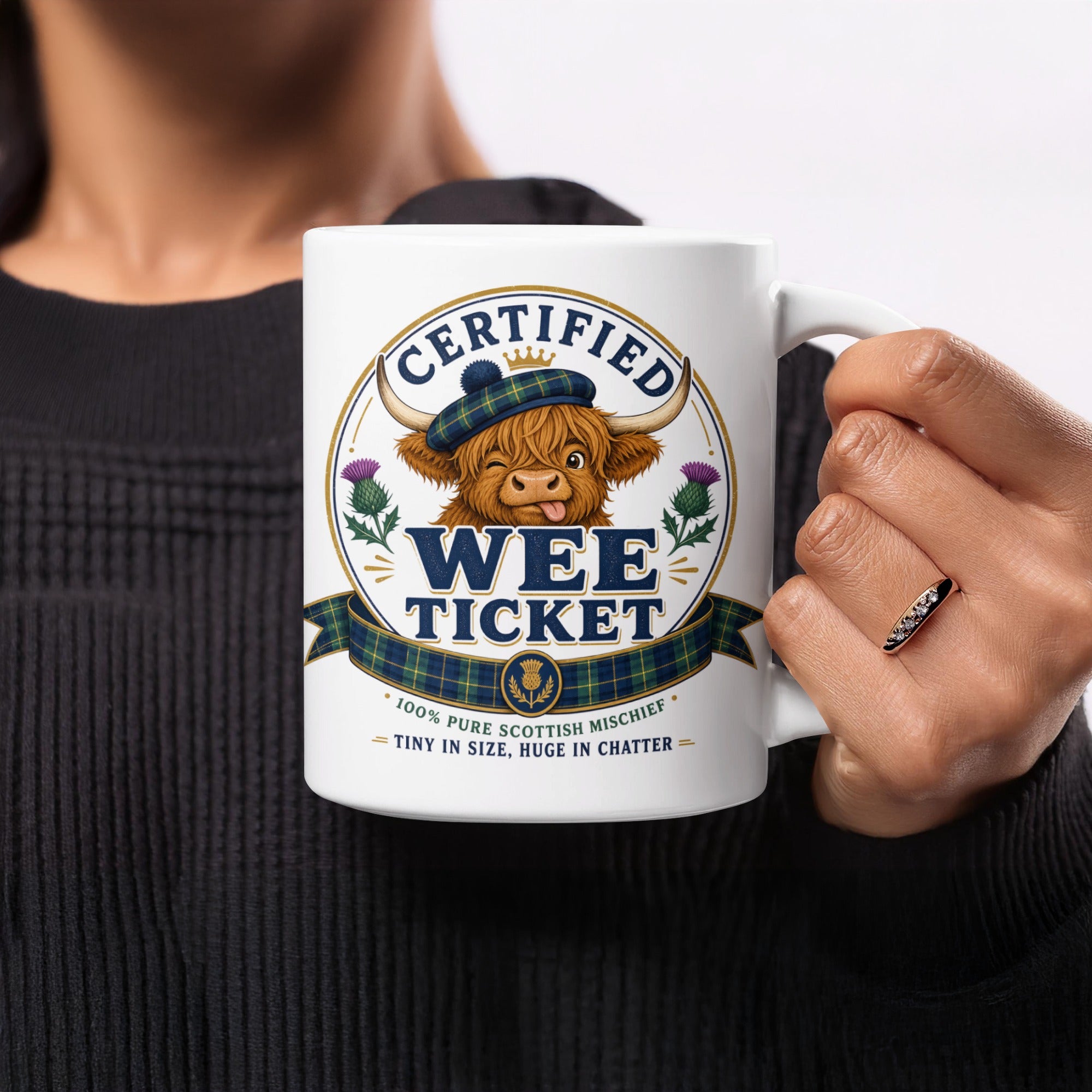 Mug with "Certified Wee Ticket" and Scottish Highland cow graphic.