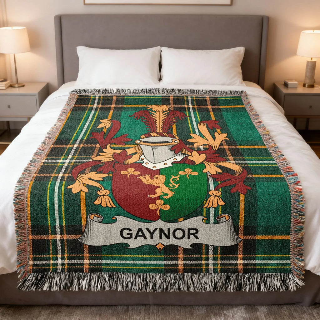 Plaid blanket with GAYNOR family crest and banner.