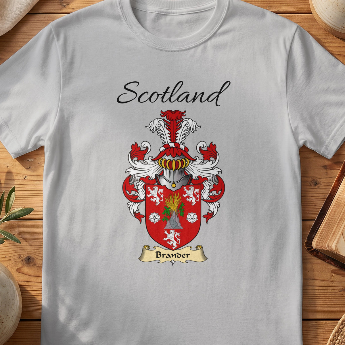 Sport Grey Brander Scottish family shield T-shirt featuring a green foliage and white motifs on red