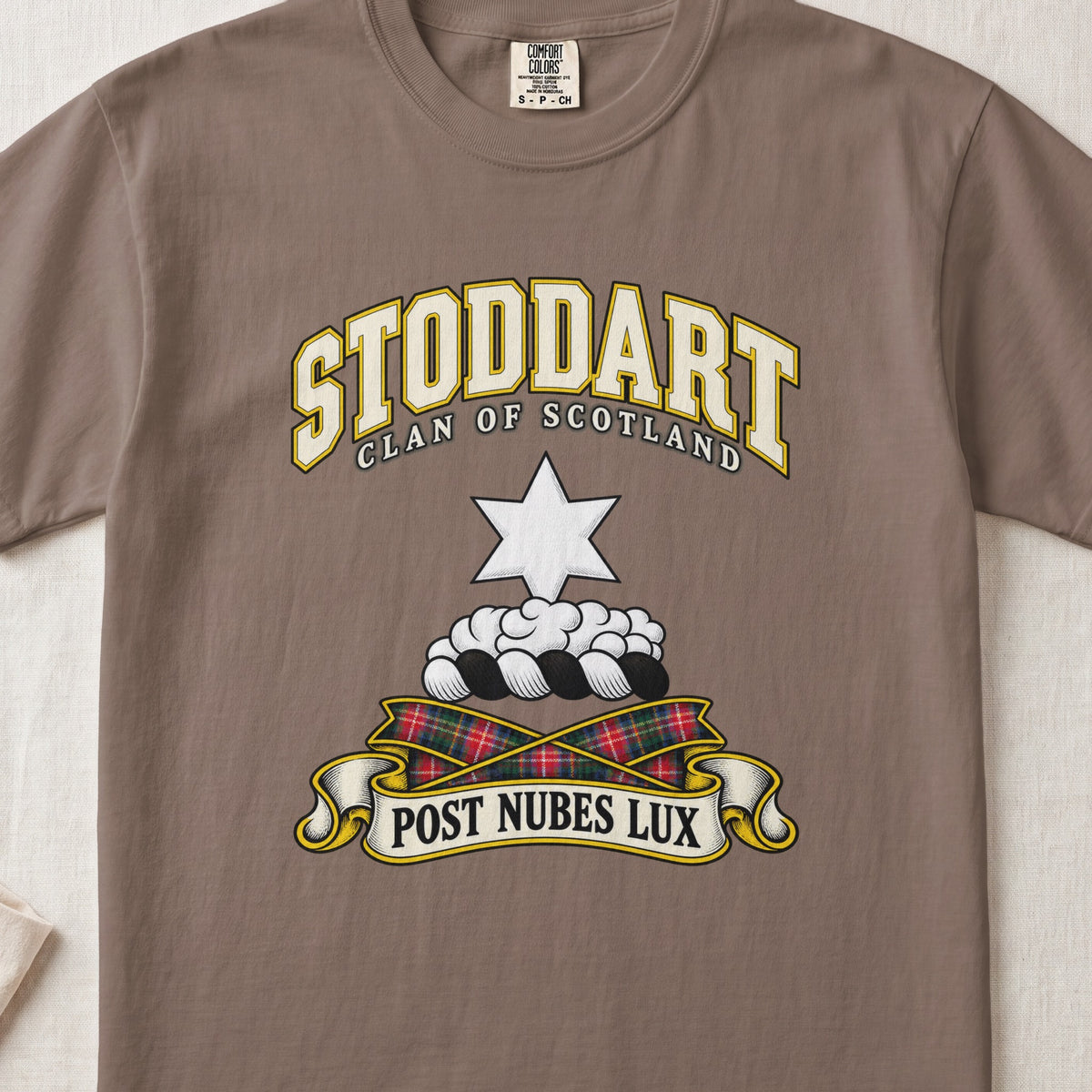 Stoddart Scottish clan T-shirt in Espresso, front view with a white six-pointed star above clouds and motto design.