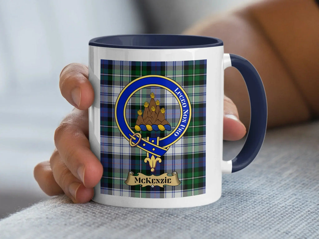 MacKenzie Luceo Non Uro clan crest tartan mug — glossy ceramic with heraldic design, black handle, 11oz