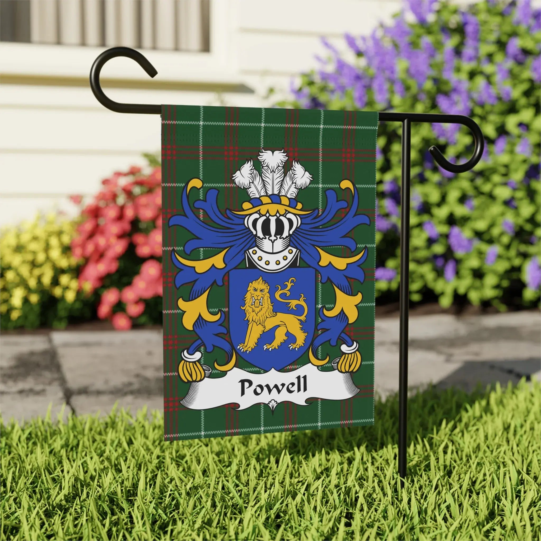 Green tartan garden flag with Powell family crest featuring a lion.
