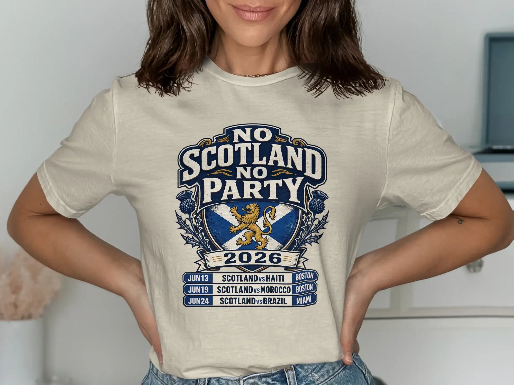 Scotland 2026 soccer team schedule with team crest and thistle graphic.