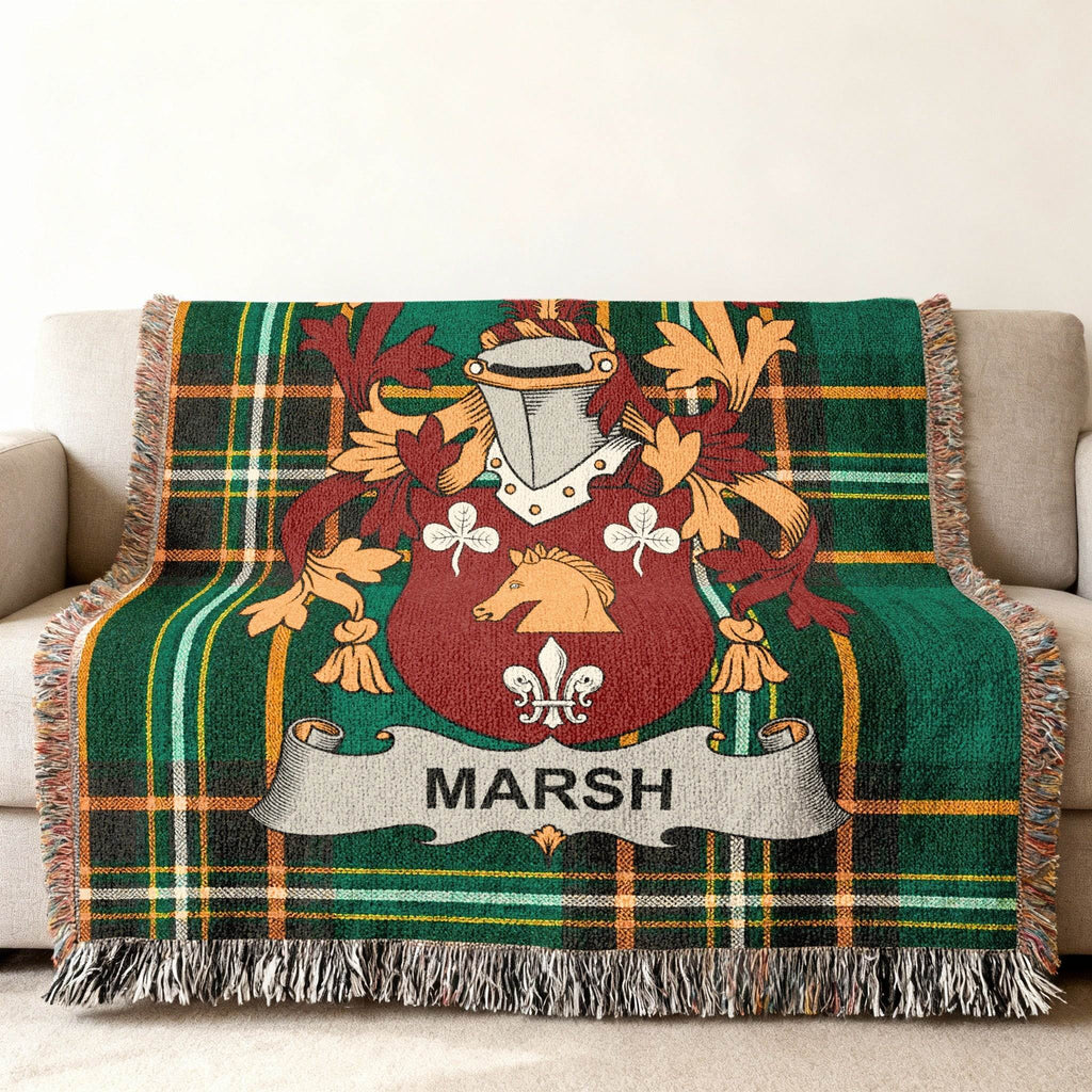 Green plaid throw blanket with the Marsh family crest.
