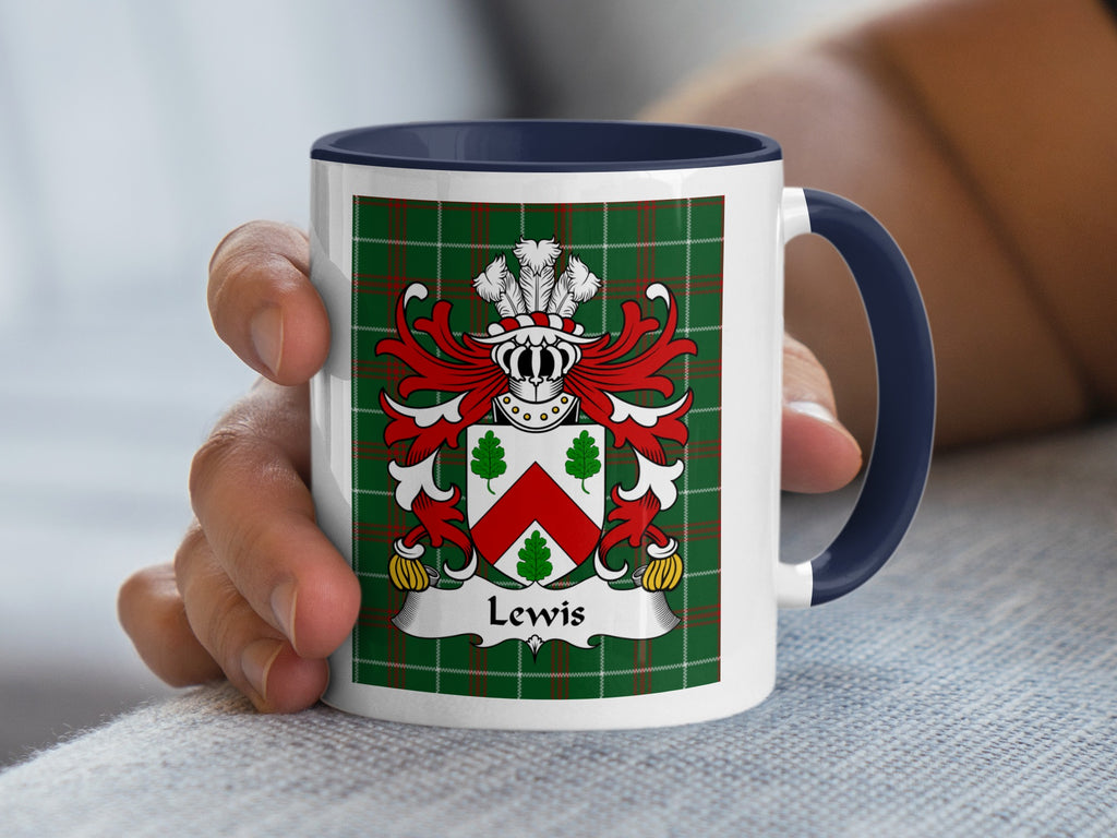 White mug with navy blue handle featuring a Lewis family crest on a green plaid background.