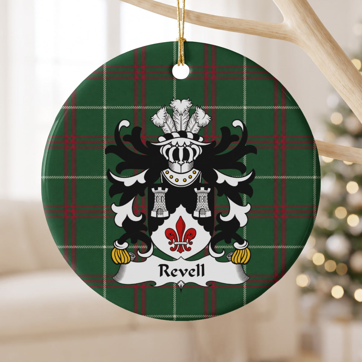 Revell ceramic ornament with two silver towers above a red fleur-de-lis on a black and white shield on Welsh National Tartan, hanging beside a window.