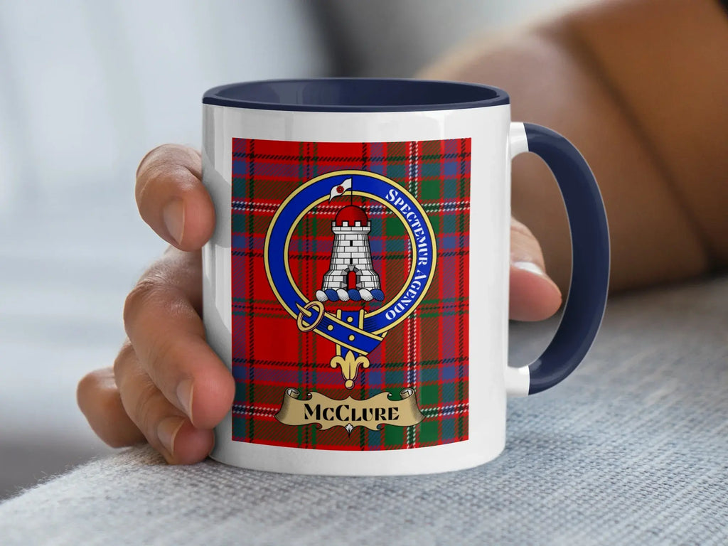 McClure family crest coffee mug with a tartan-background design
