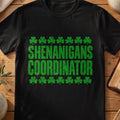 Black funny Irish T-shirt with green shamrocks and “Shenanigans Coordinator” text.