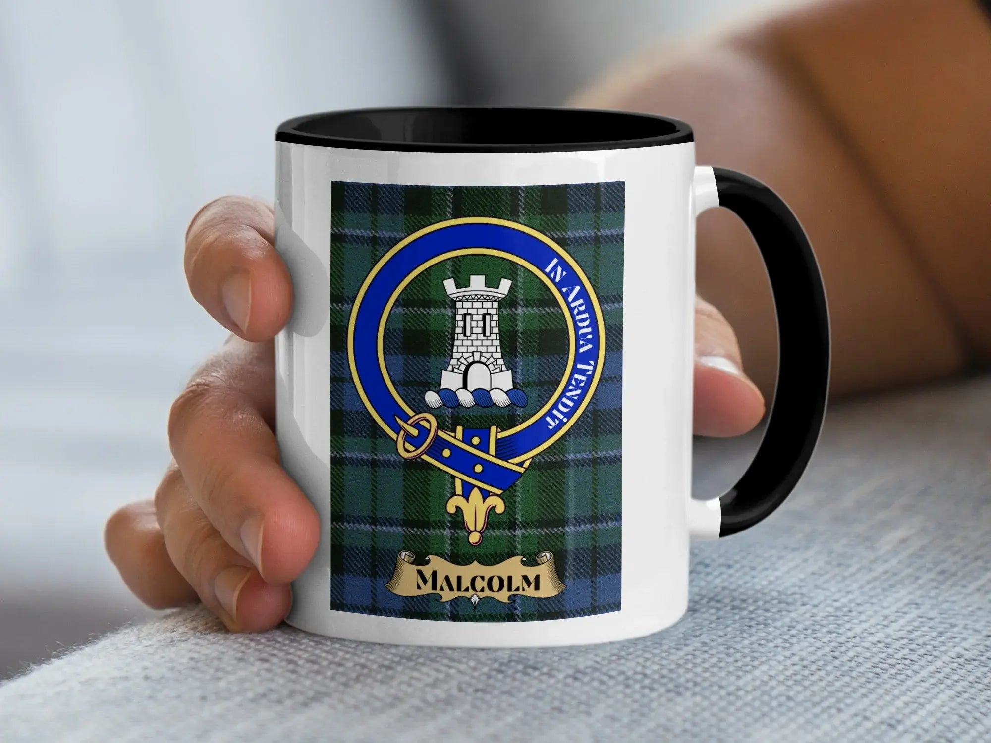 Clan Malcolm tartan accent mug with black handle — 11oz glossy ceramic showing tower crest and In Ardua Tendit motto