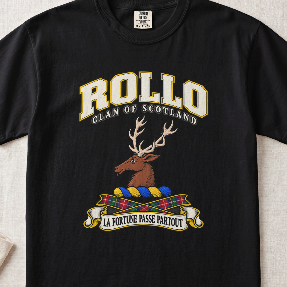 Rollo Scottish clan T-shirt in Black, front view with a brown stag head with antlers and motto design.