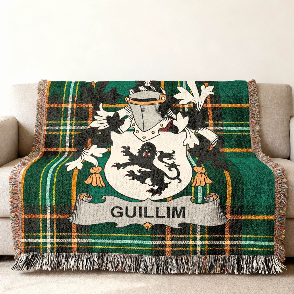 Green plaid throw blanket with a Guillim family crest.