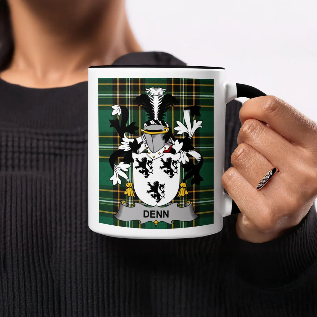 Mug with Denn family crest on green tartan background.