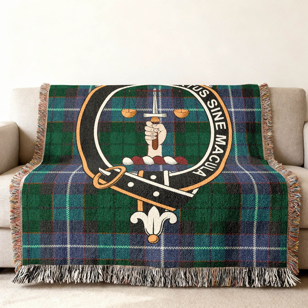 Russell clan crest woven blanket — tartan plaid with fringe display