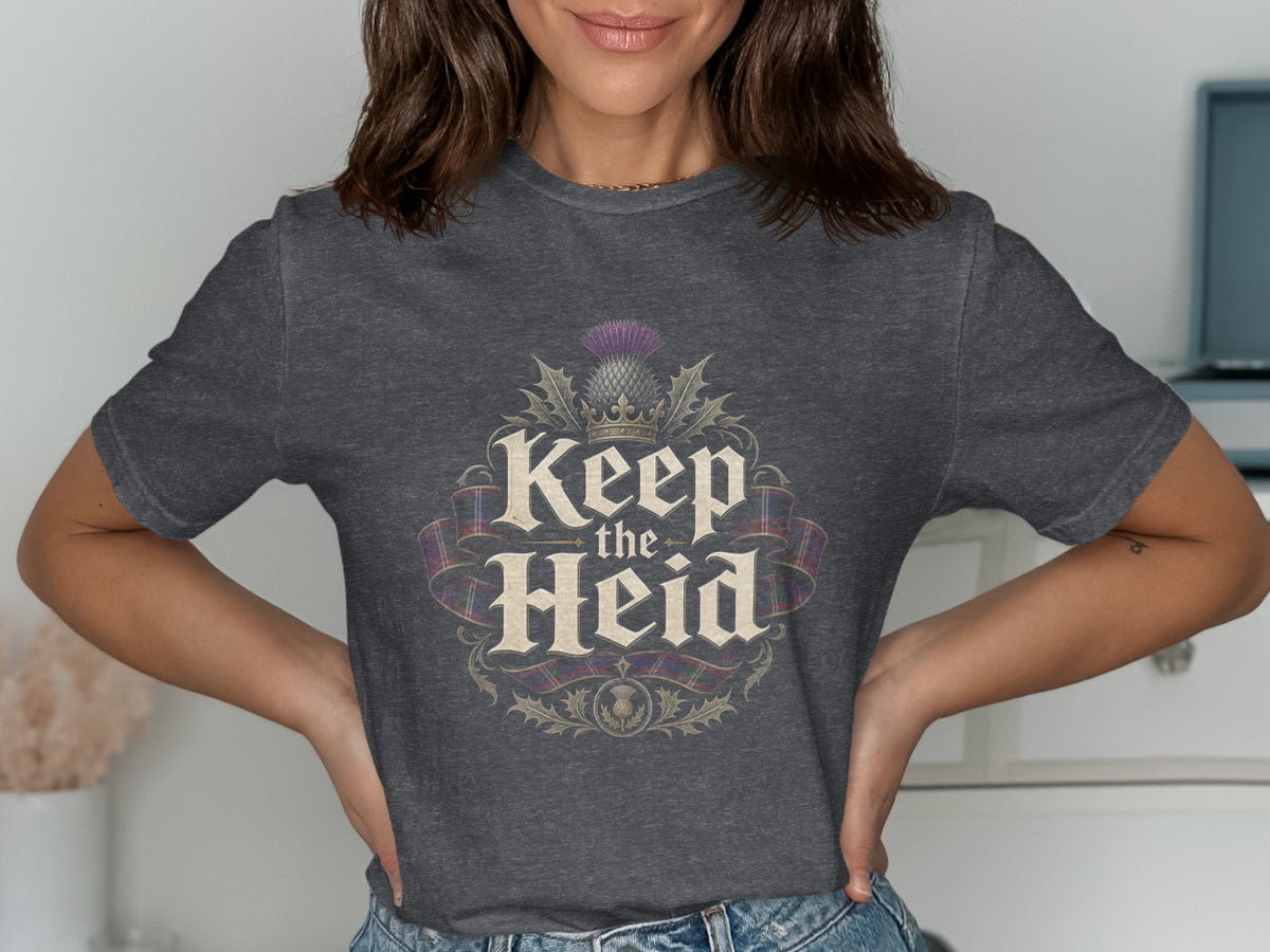 Dark grey t-shirt with "Keep the Heid" text, thistle, and tartan ribbon design.