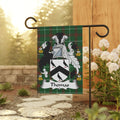 Green tartan crest with "Thomas" nameplate on garden flag.